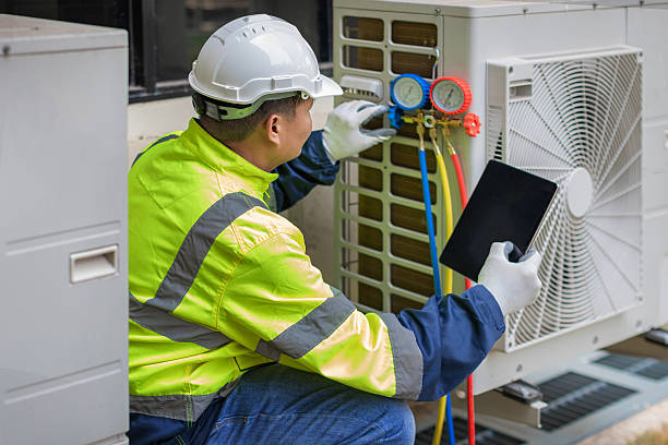 Professional Ac Installation technician working in Abington, MA